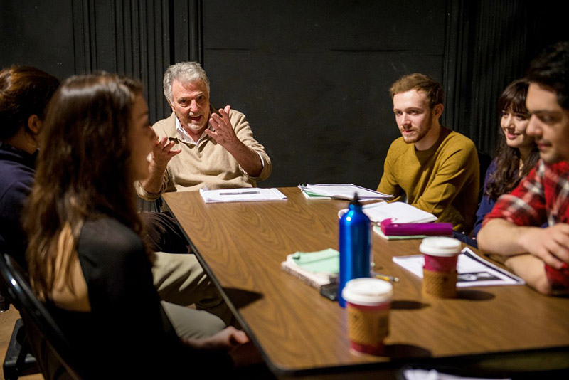 Students with Bolt reading through a new play for the Company season