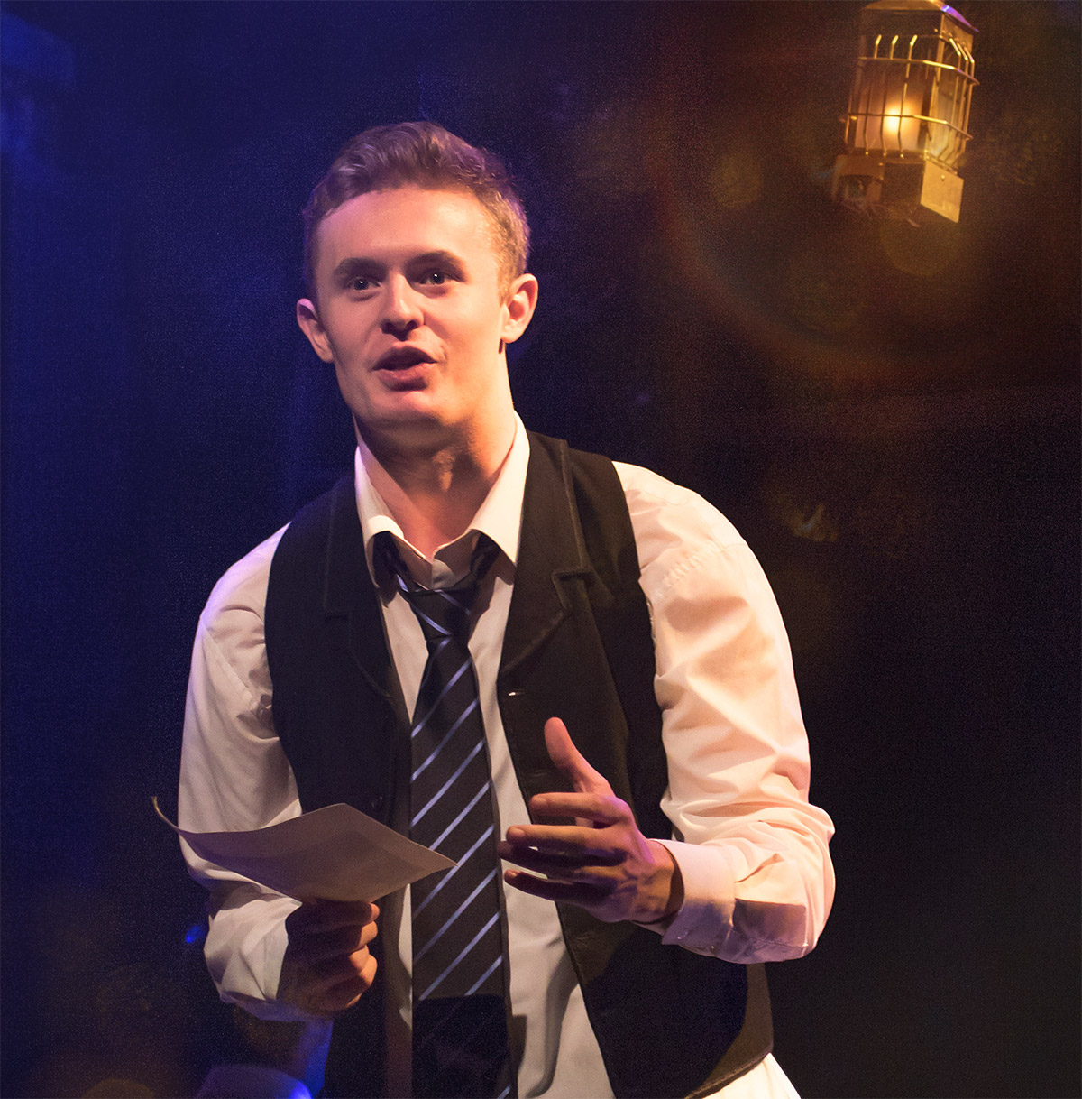 Young male actor on stage